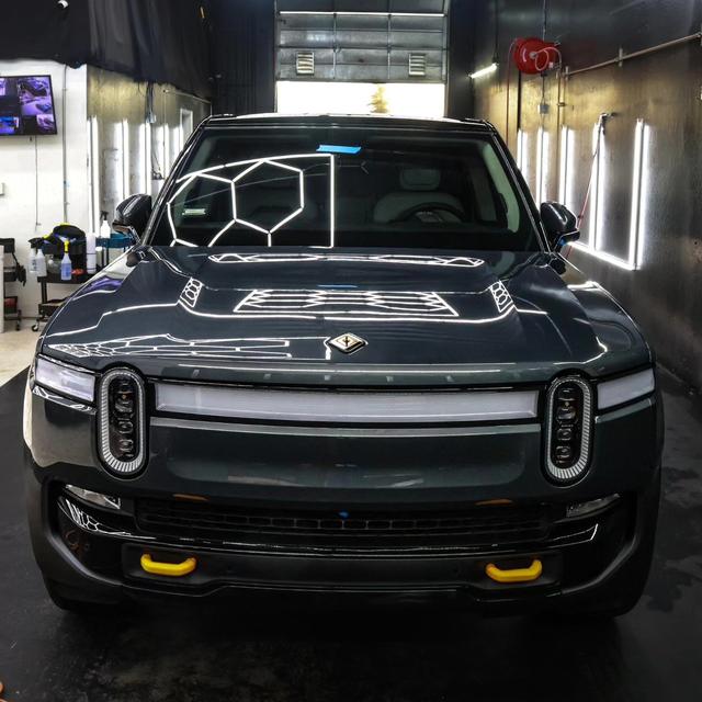 Black Rivian R1T in the 68 Auto Film bay